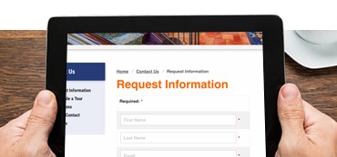 Person holding tablet with request information form